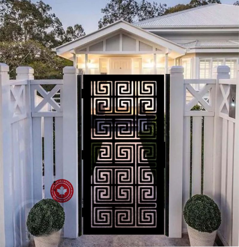 Contemporary laser-cut steel gate with Greek pattern and white picket fence