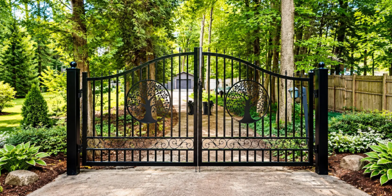 Ornate Gate Through Woodland Drive